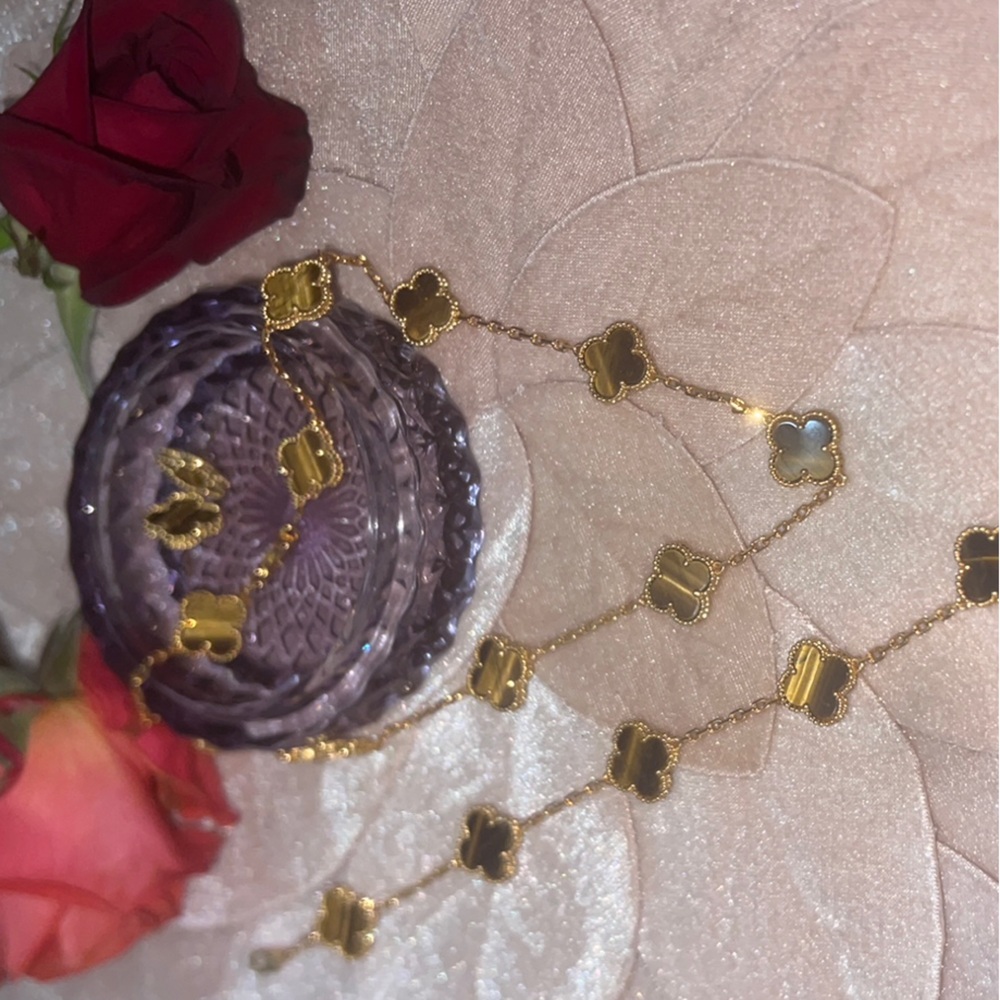 Gold and Black Clover Pendant Set. Includes: Necklace, Earrings and Bracelet.